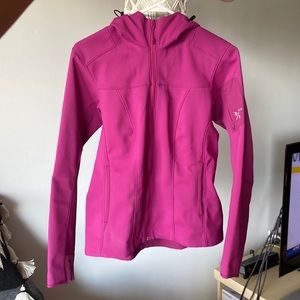 Pink magenta in color. Warm, Weather resistant soft shell hoodie for women